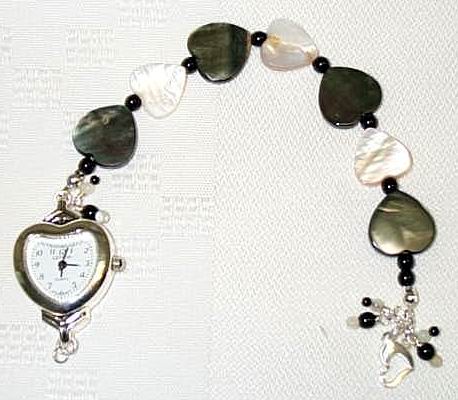 black abalon and mother of pearl watch